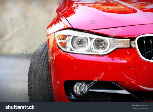 stock photo red car outdoors 3167528601